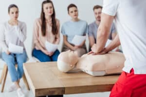 perform cpr wait for an ambulance